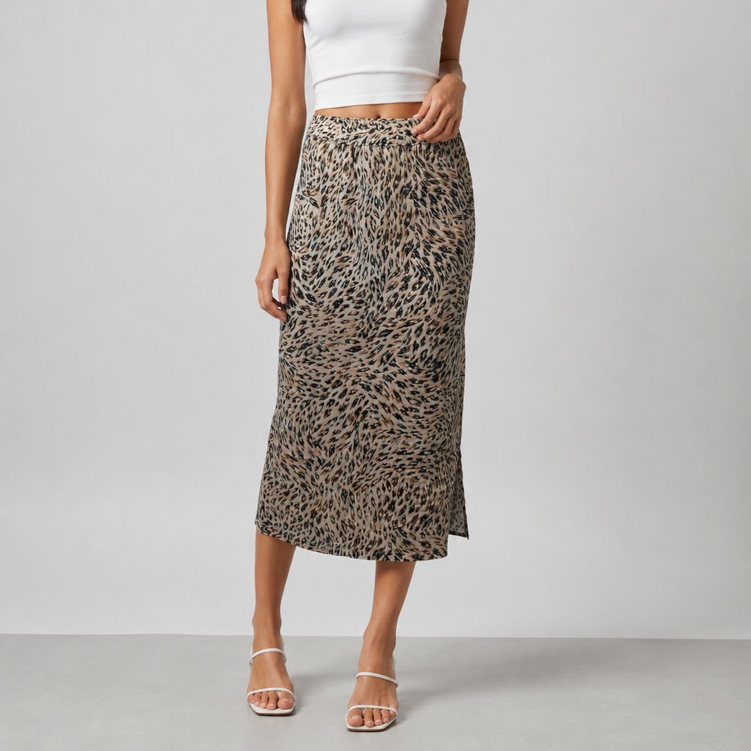 Women's midi pencil skirt with animal print – elastic waistband, lightweight fabric, and a flattering slim fit ideal for casual or evening wear.