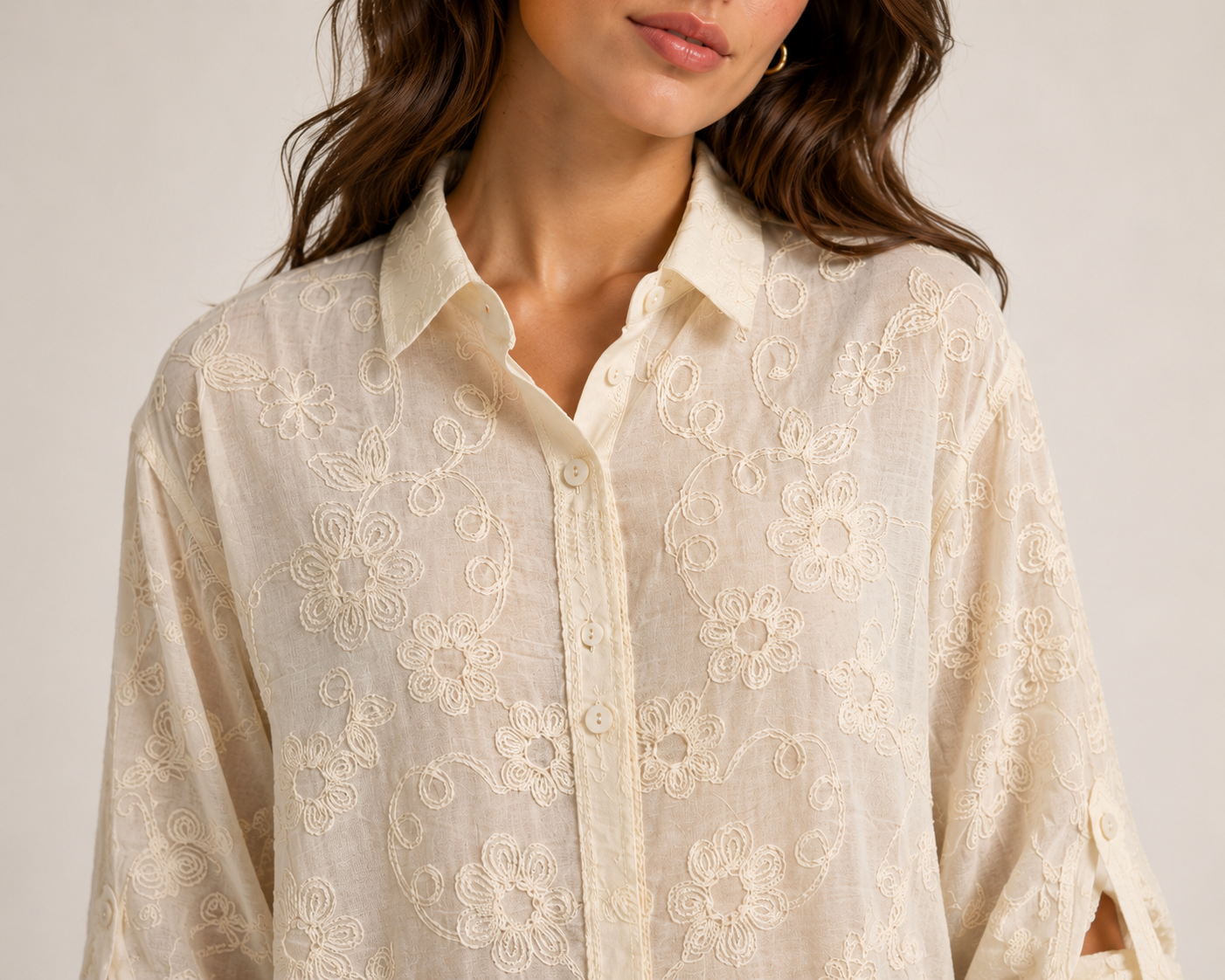 Ladies Willow Floral Embroidered Blouse featuring delicate floral embroidery, a relaxed fit, button-front fastening, and roll-tab sleeves. Perfect for casual and smart-casual styling.
