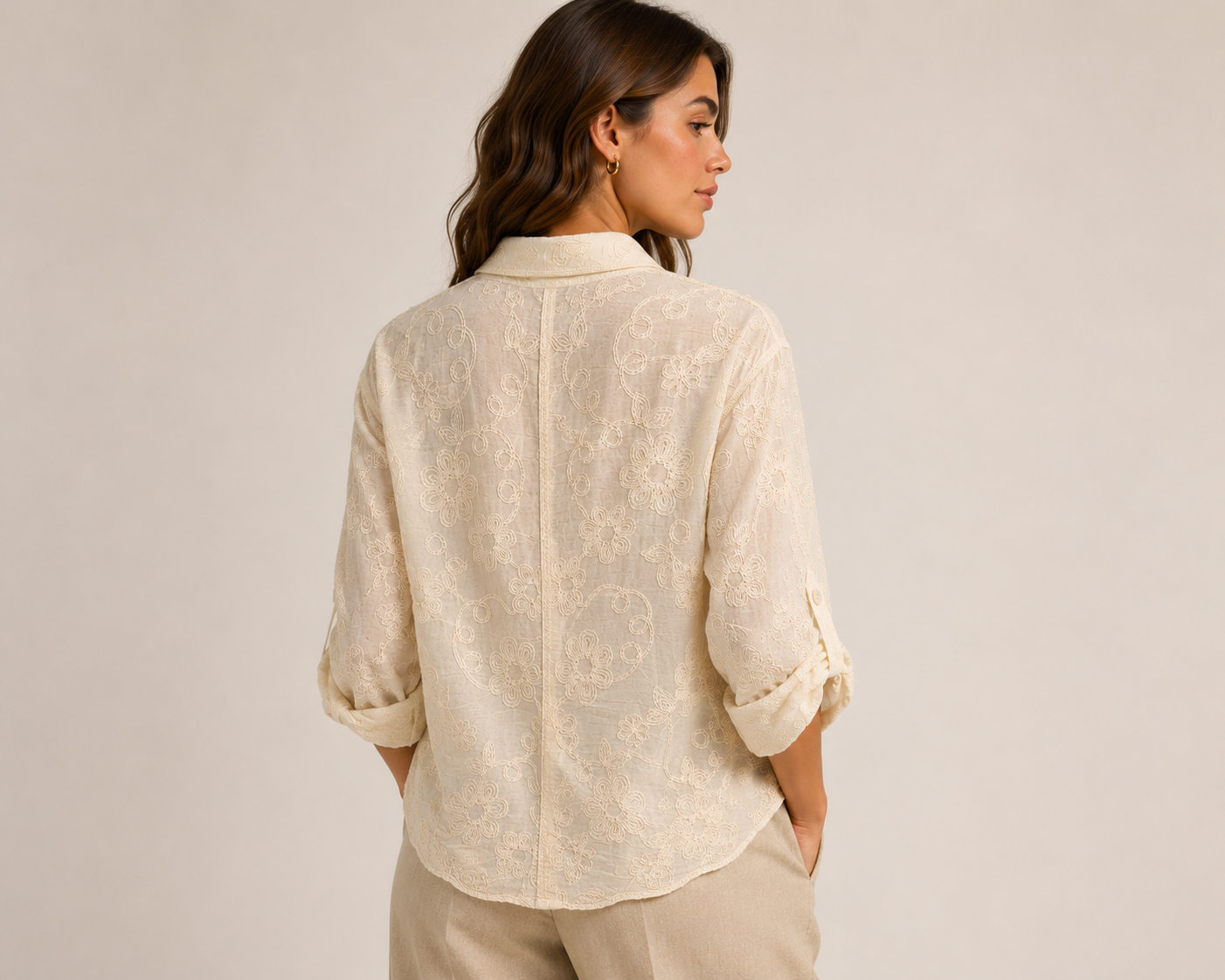 Ladies Willow Floral Embroidered Blouse featuring delicate floral embroidery, a relaxed fit, button-front fastening, and roll-tab sleeves. Perfect for casual and smart-casual styling.