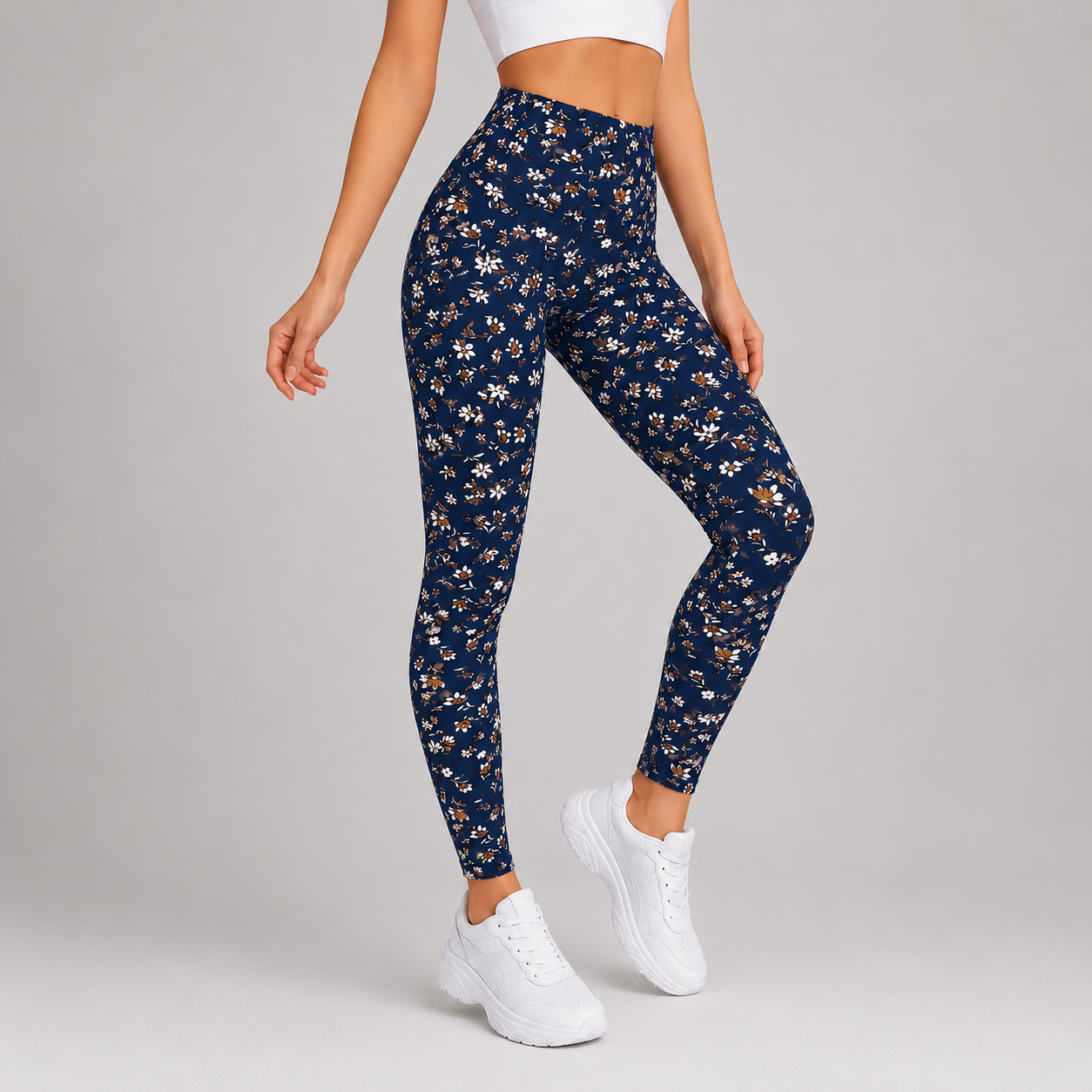 Women's full-length women's leggings in navy blue with beige floral print, soft stretchy fabric, ideal for casual wear, yoga, and everyday outfits.