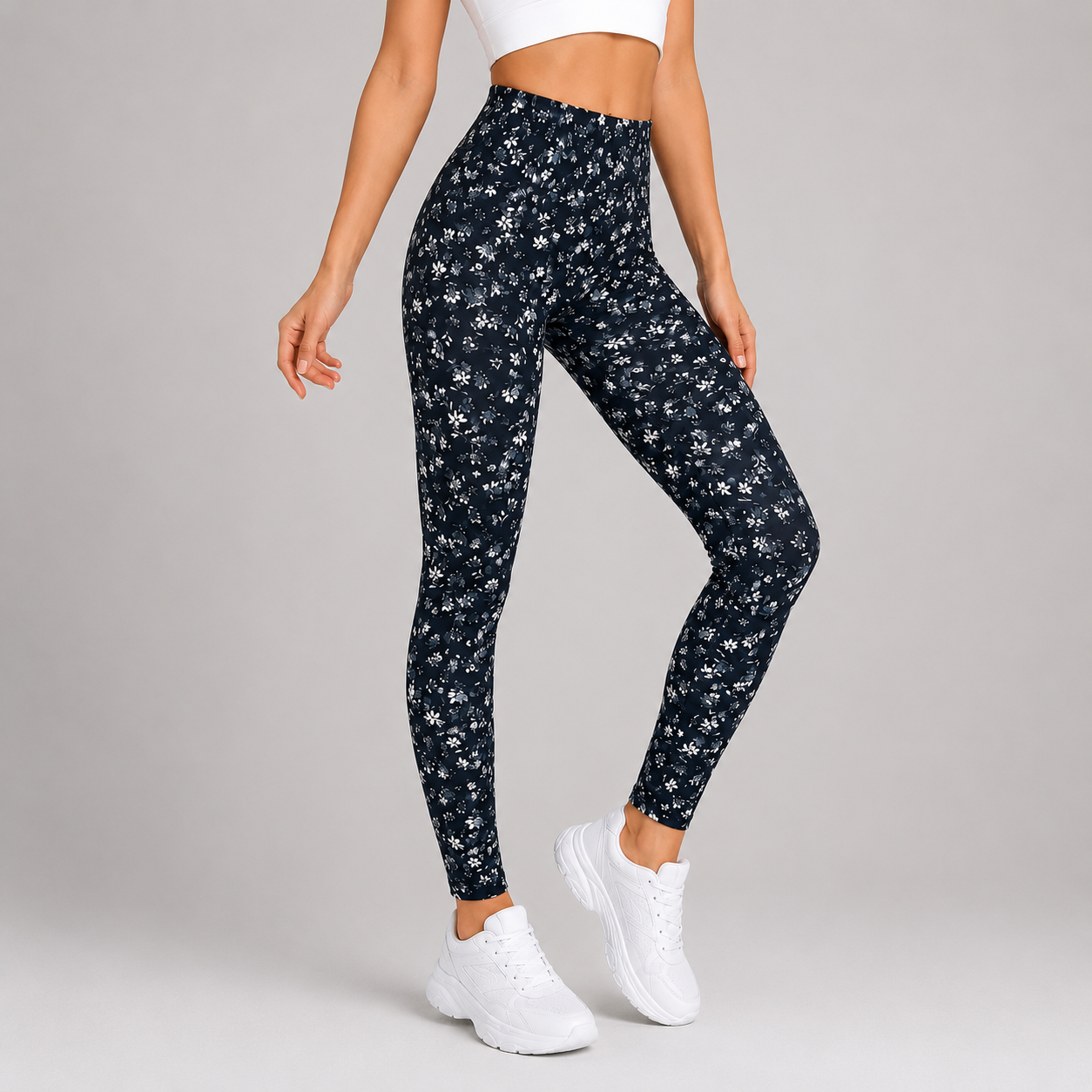Ladies full-length women's leggings in black with white floral print, soft stretchy fabric, ideal for casual wear, yoga, and everyday outfits.
