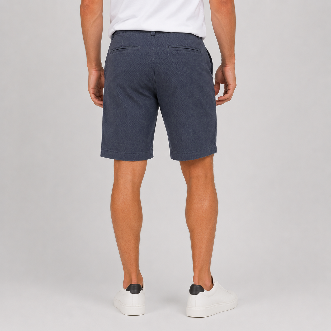 Men’s navy cotton stretch twill shorts with tailored fit, side pockets, rear welt pocket, and textured woven fabric for smart casual summer wear.
