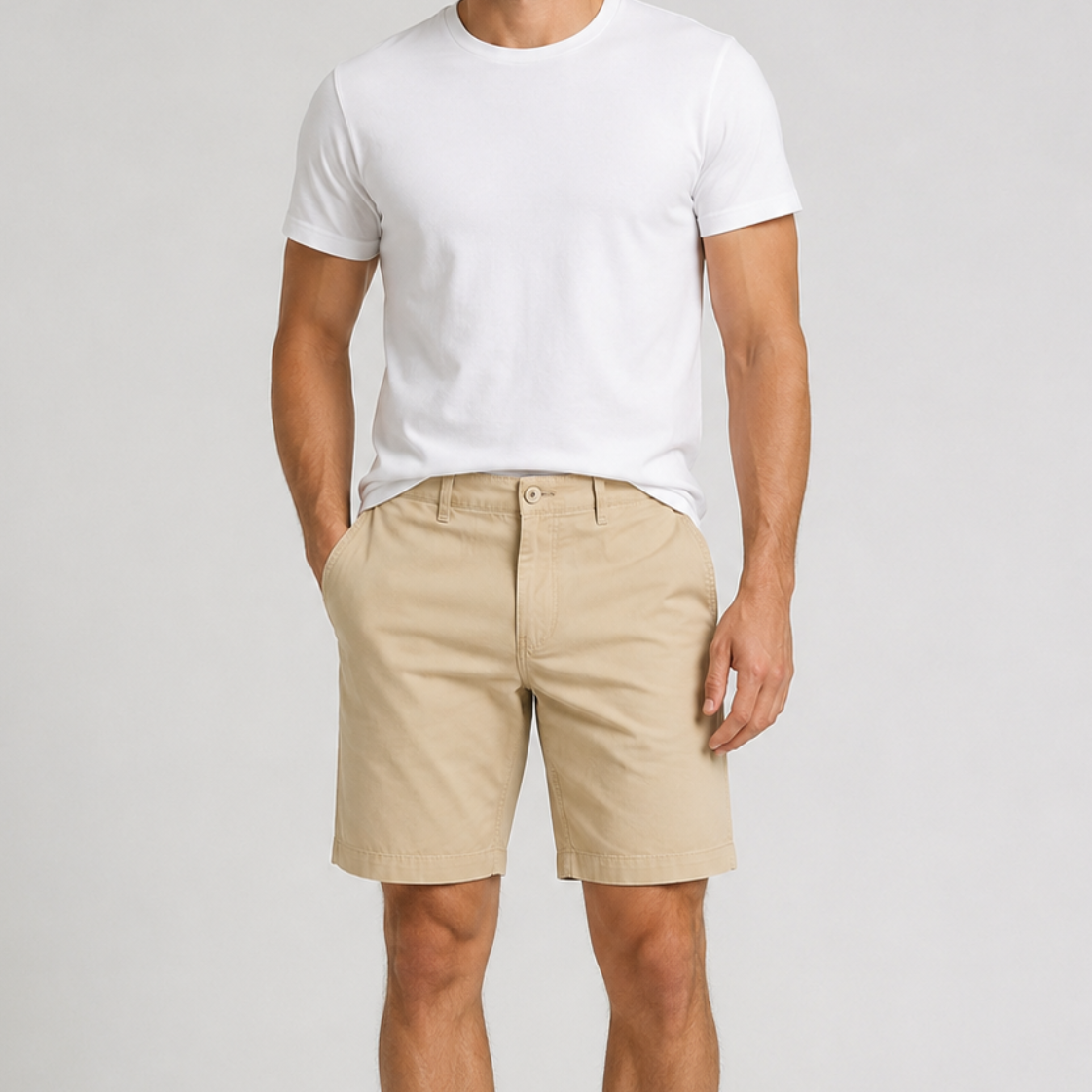Men's beige chino shorts with white crew neck t-shirt and white sneakers