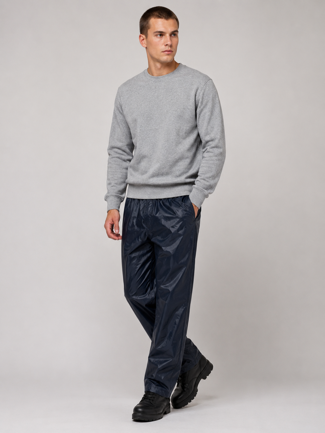 Stay dry in all weather with these lightweight waterproof over trousers. Featuring a comfortable elastic waistband and durable rainproof material, ideal for workwear, outdoor activities, walking, cycling, and wet weather protection.