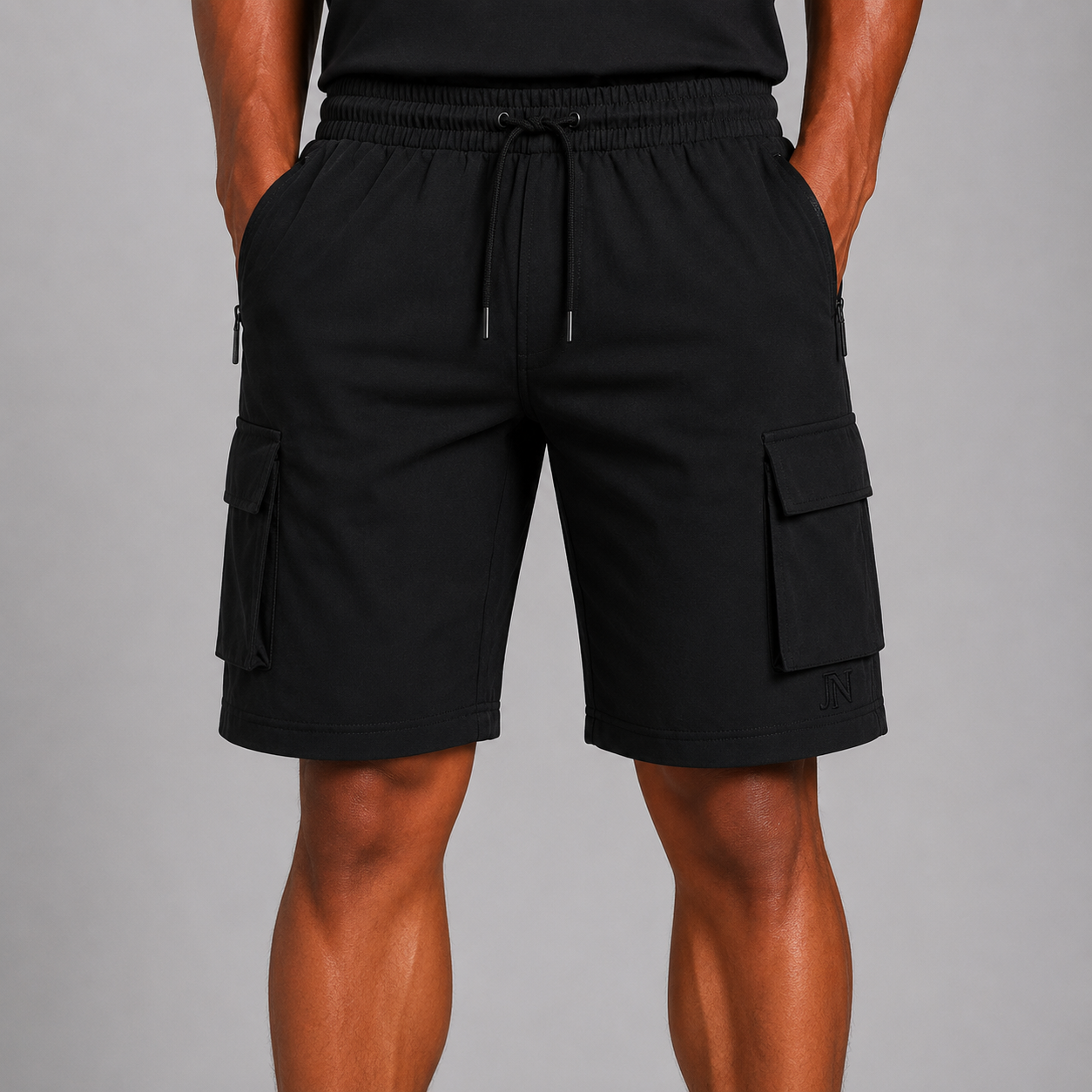 Men’s black cargo shorts with drawstring waist and utility pockets, modern streetwear shorts