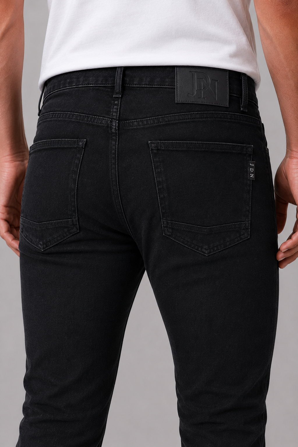 Men's JDN branded slim fit jeans in washed black denim with tapered leg and five-pocket design