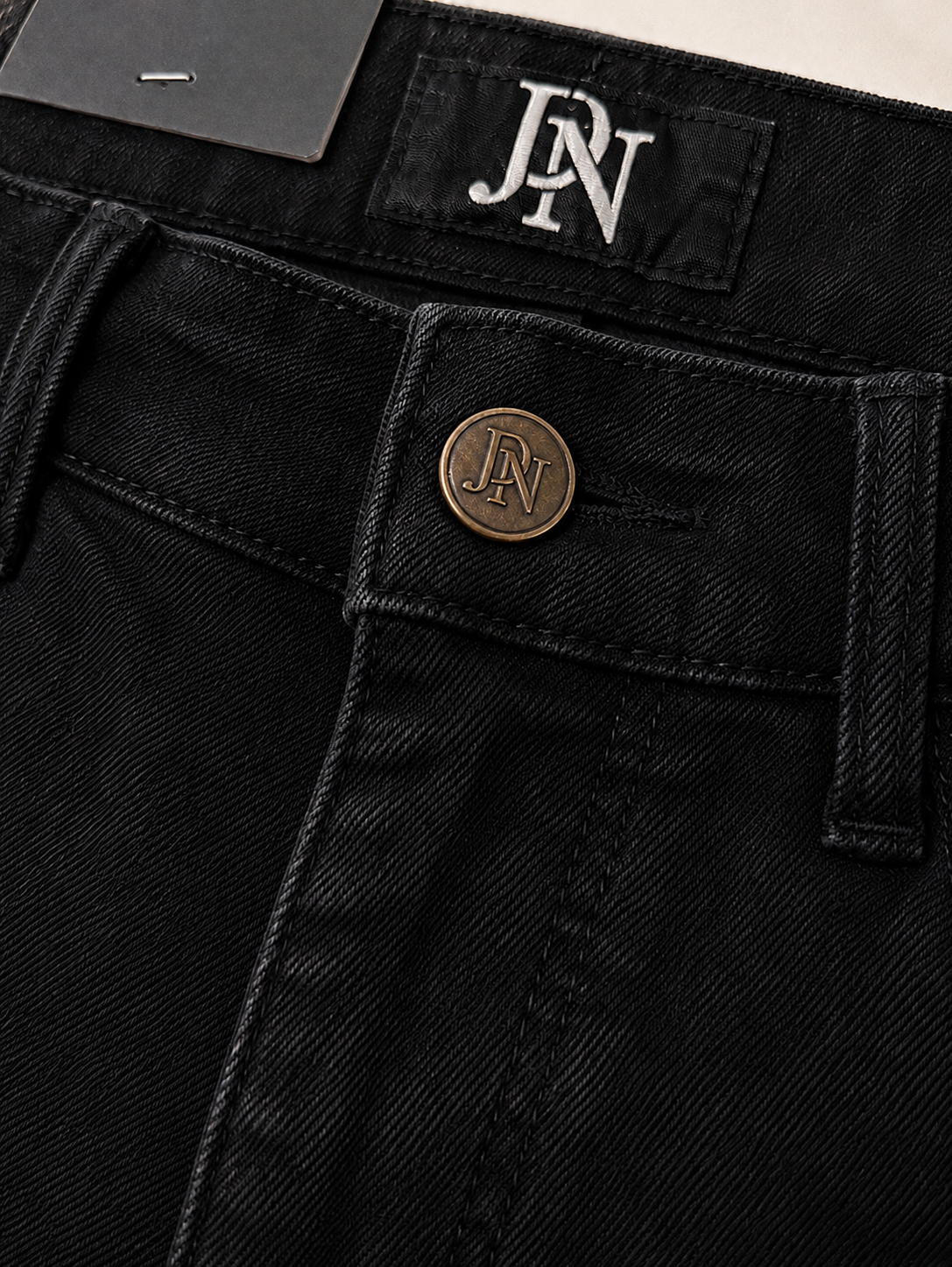 Men's JDN branded slim fit jeans in washed black denim with tapered leg and five-pocket design