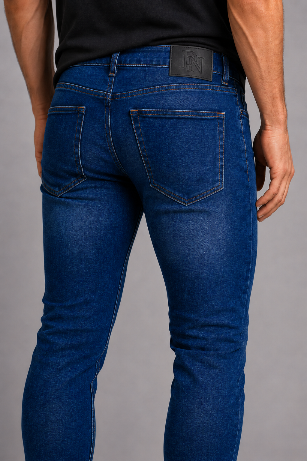 Men's JDN slim fit jeans in dark denim blue with classic five-pocket design and button fastening