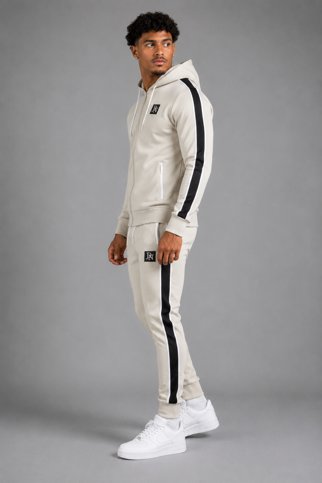 Men's JDN beige tracksuit set with white zips and black side stripes – full zip hoodie and joggers, modern streetwear