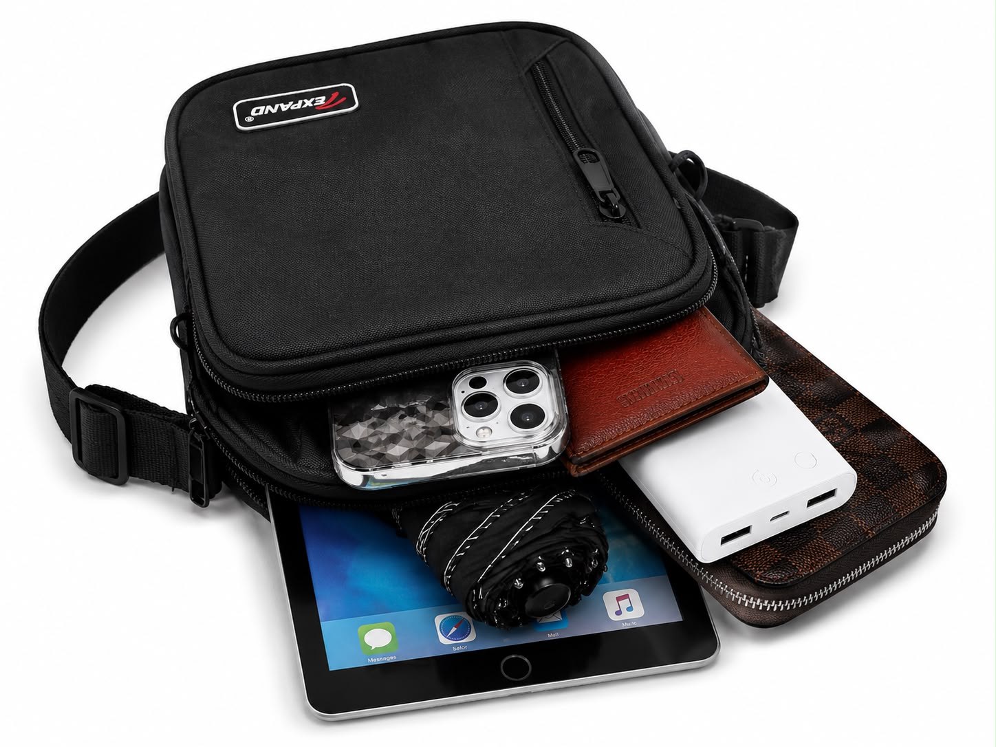 Black men’s crossbody bag with adjustable shoulder strap, multiple zipped compartments and a compact design, ideal for everyday use, travel and keeping essentials organised.