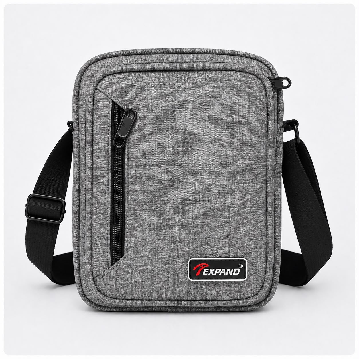 Grey men’s crossbody bag with adjustable shoulder strap, multiple zipped compartments and a compact design, ideal for everyday use, travel and keeping essentials organised.