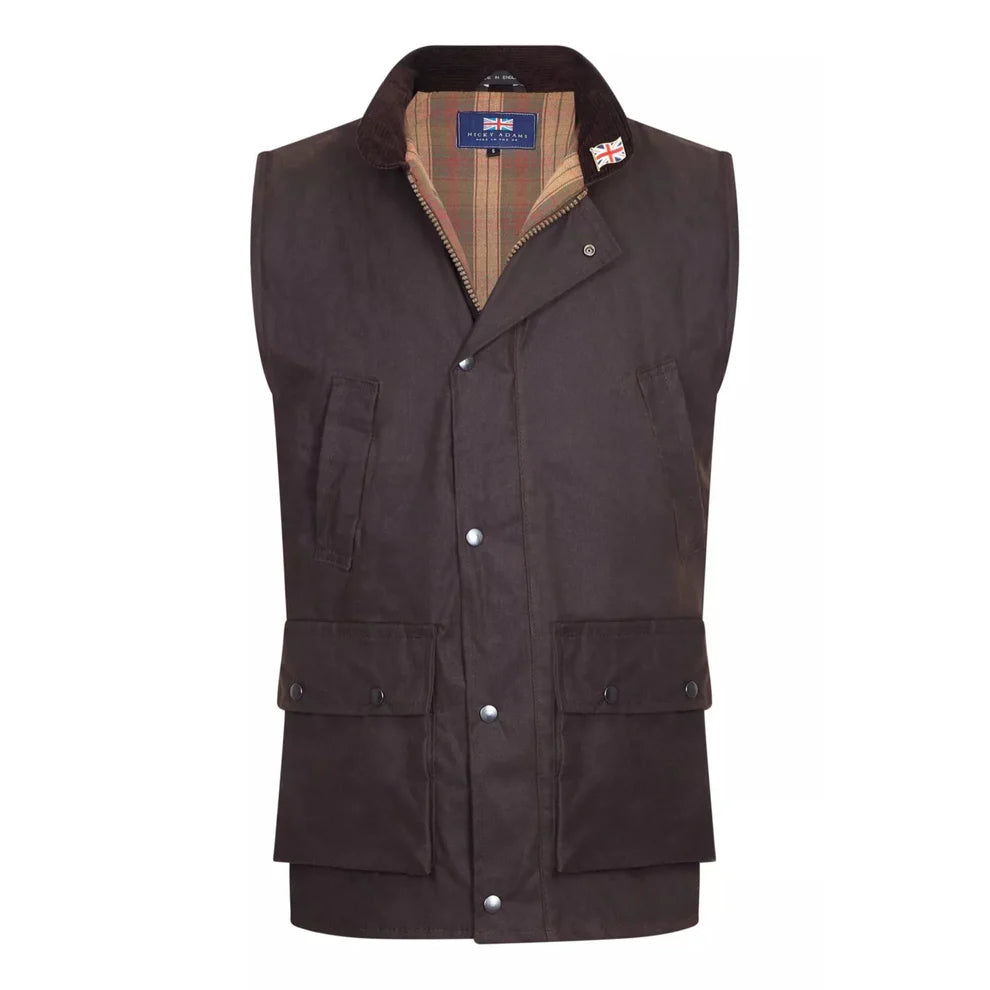 Shop the Nicky Adams Men’s Wax Waistcoat, a classic country gilet with durable waxed cotton, corduroy collar, tartan lining, and practical pockets. Ideal for outdoor wear, shooting, farming, and country walks.