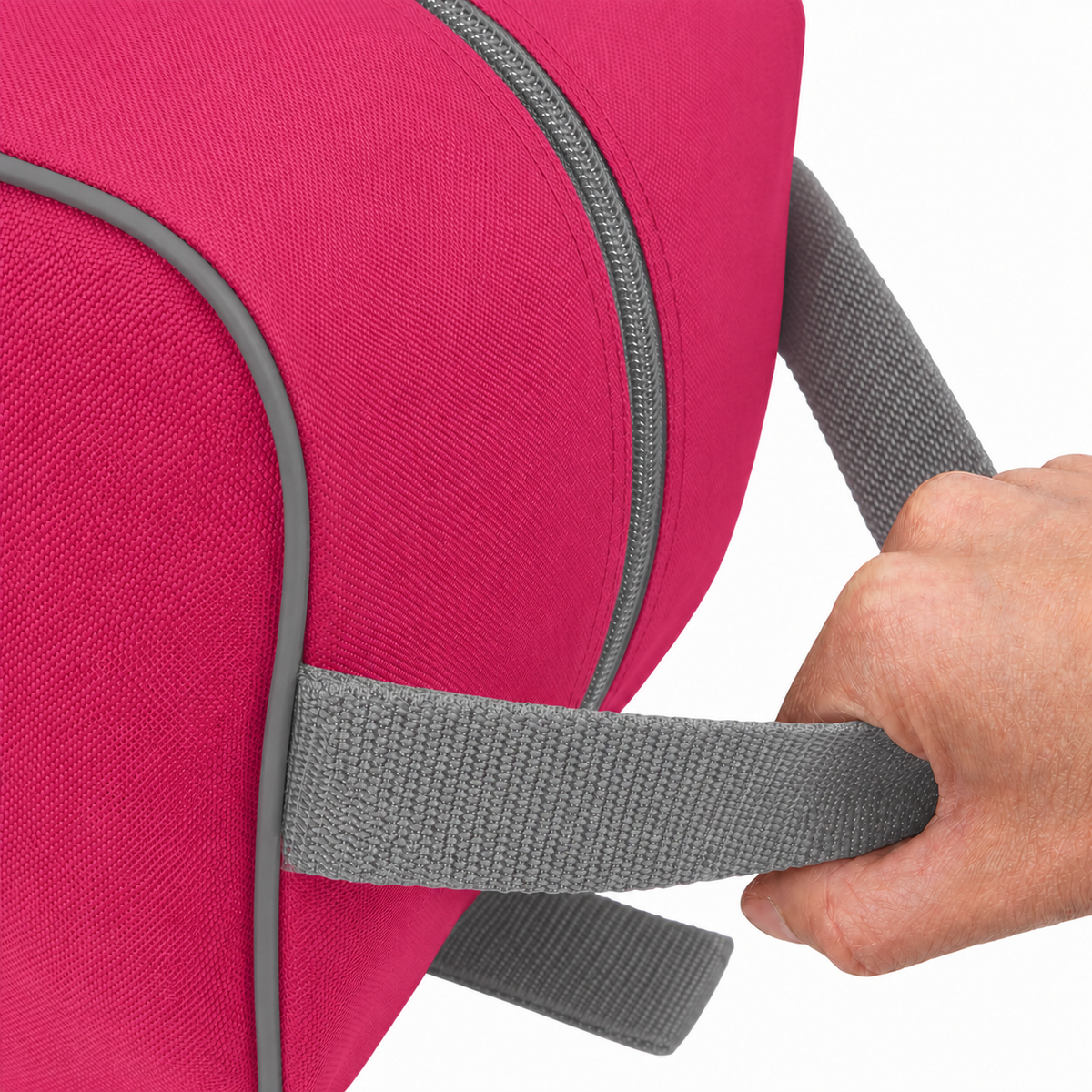 Pink waterproof boot bag with a curved zip opening and durable fabric finish.