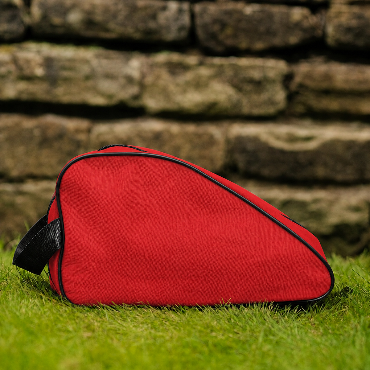 Red waterproof boot bag with a curved zip opening and durable fabric finish