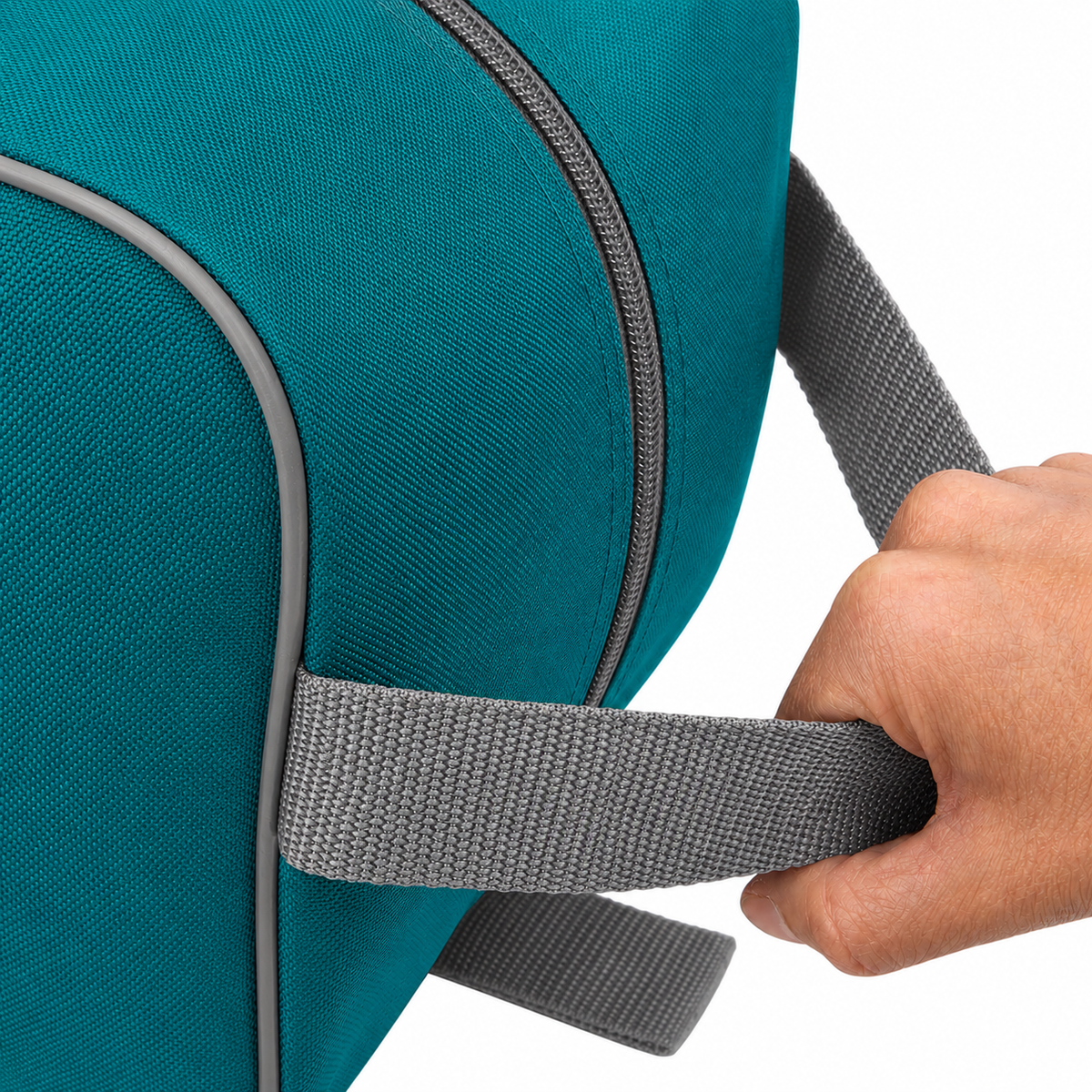 Teal waterproof boot bag with a curved zip opening and durable fabric finish