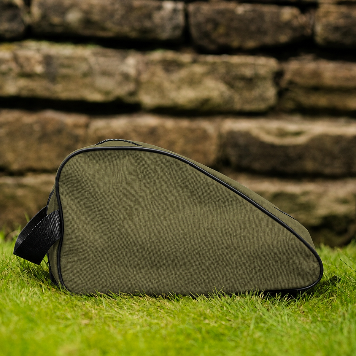 Olive waterproof boot bag with a curved zip opening and durable fabric finish.