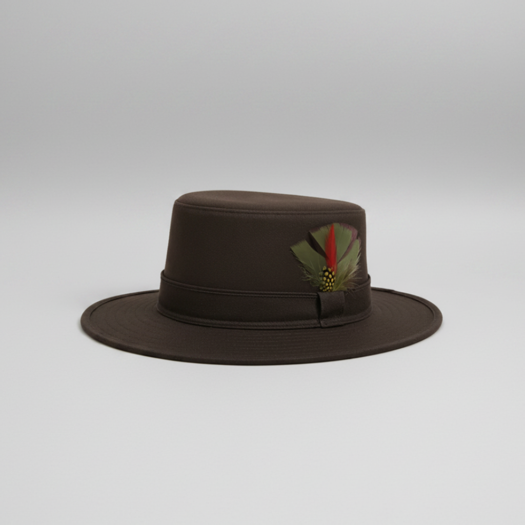 Dark brown wide-brim waterproof hat with flat crown, feather accent, and stitched detailing on a white background.