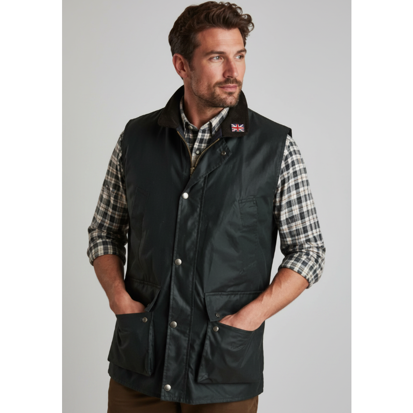 Shop the Nicky Adams Men’s Wax Waistcoat, a classic country gilet with durable waxed cotton, corduroy collar, tartan lining, and practical pockets. Ideal for outdoor wear, shooting, farming, and country walks.