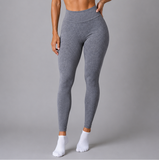 Upgrade your activewear collection with these flattering high-waisted ribbed leggings. Designed for both comfort and style, they offer a sculpting fit with a soft, stretchy fabric that moves with you.