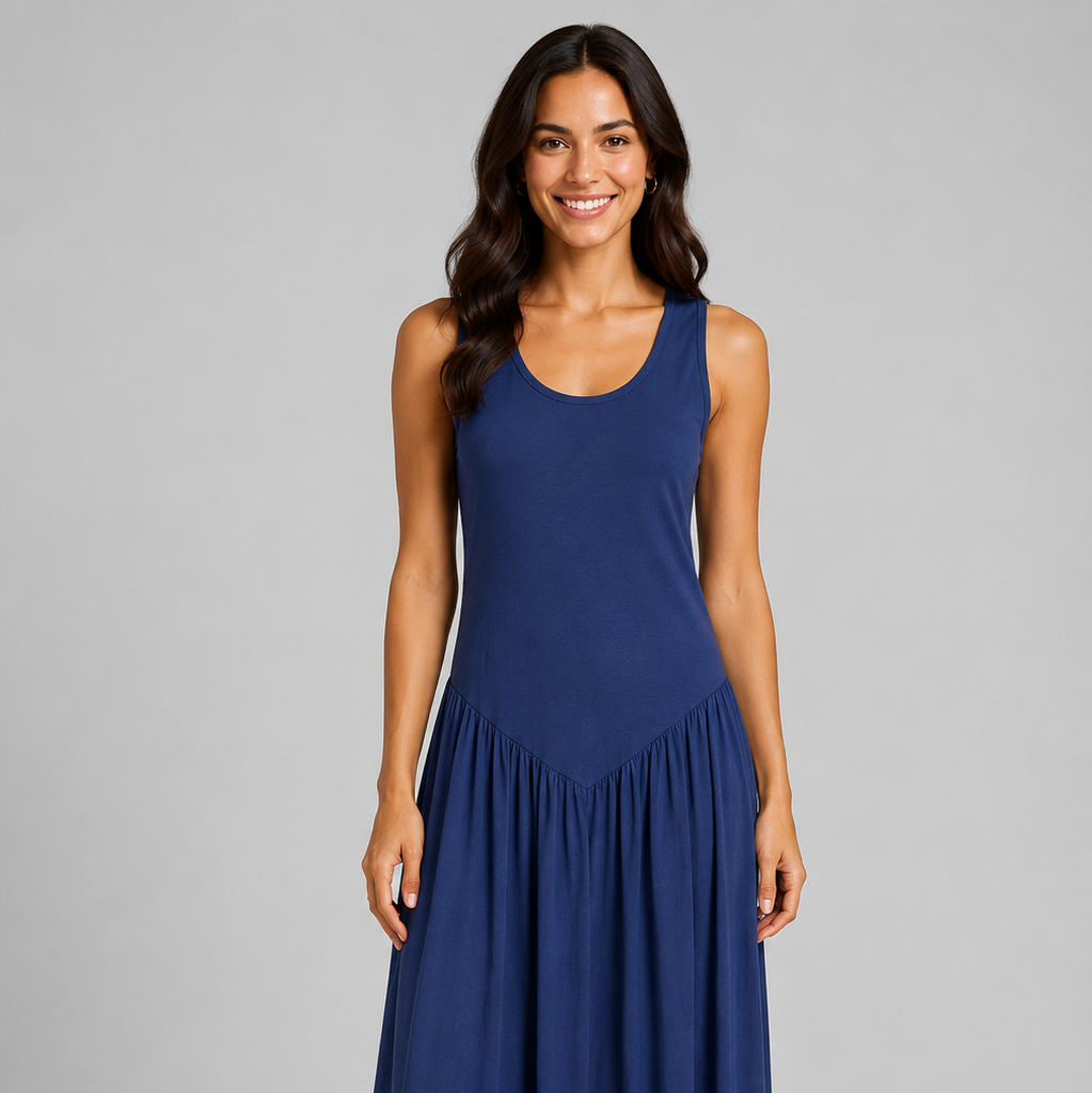 Women's sleeveless maxi dress featuring a scoop neckline, fitted bodice, and flowing gathered skirt. Shown in a soft brown jersey fabric with a relaxed silhouette and maxi length, styled on a model against a light grey studio background.