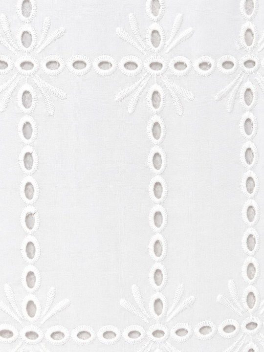 Women's white broderie anglaise maxi dress with a shirred bodice, tiered skirt and embroidered eyelet detailing, perfect for summer holidays and special occasions.