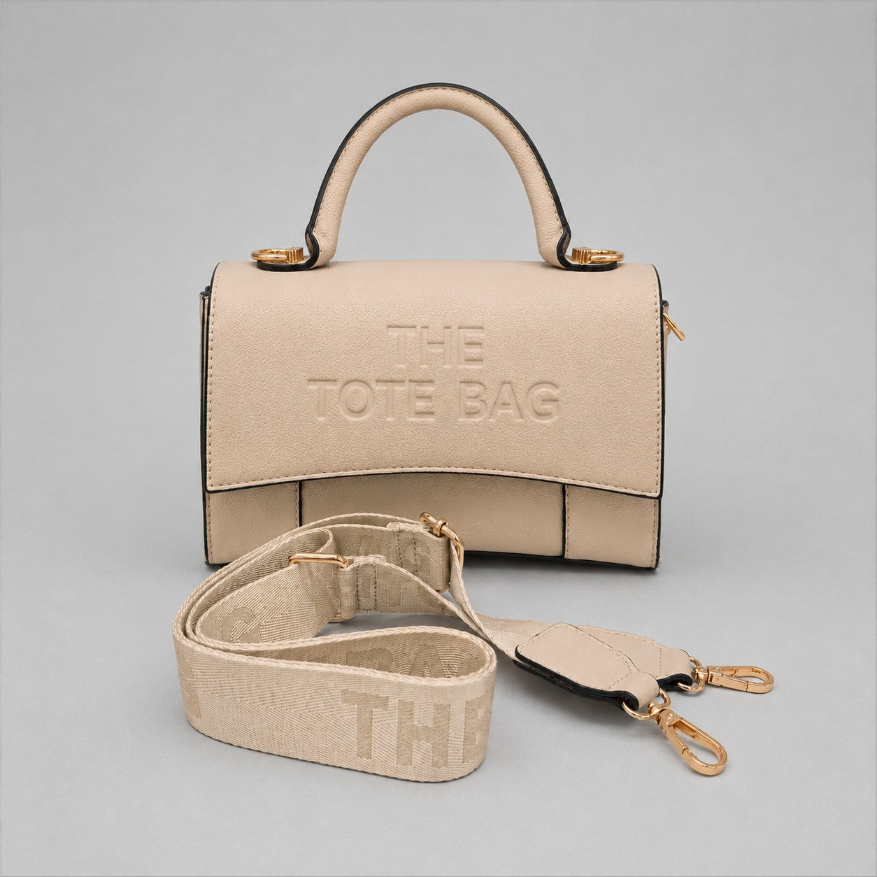 Ladies Tote Bag in Beige. A stylish structured handbag with top handle, detachable shoulder strap, gold-tone hardware and designer-inspired detailing.