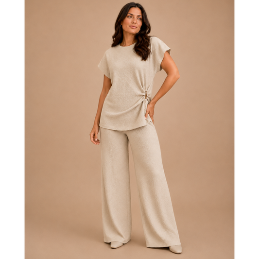Women’s textured wide leg co-ord set with relaxed draped top and matching flowy trousers, elegant two piece lounge outfit for casual chic styling.