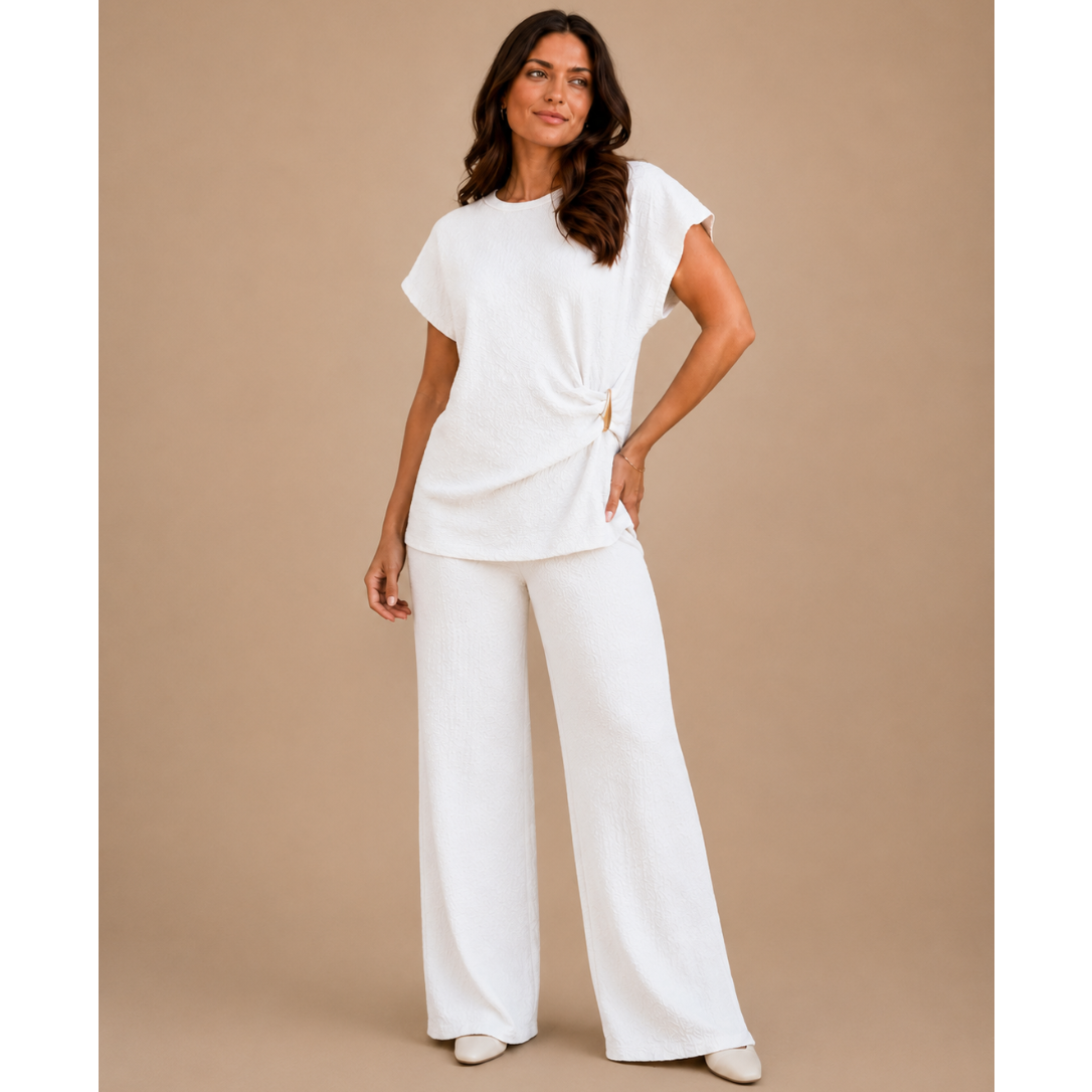 Women’s textured wide leg co-ord set with relaxed draped top and matching flowy trousers, elegant two piece lounge outfit for casual chic styling.
