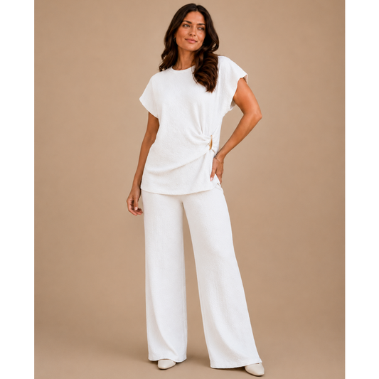 Women’s textured wide leg co-ord set with relaxed draped top and matching flowy trousers, elegant two piece lounge outfit for casual chic styling.