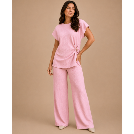 Women’s textured wide leg co-ord set with relaxed draped top and matching flowy trousers, elegant two piece lounge outfit for casual chic styling.