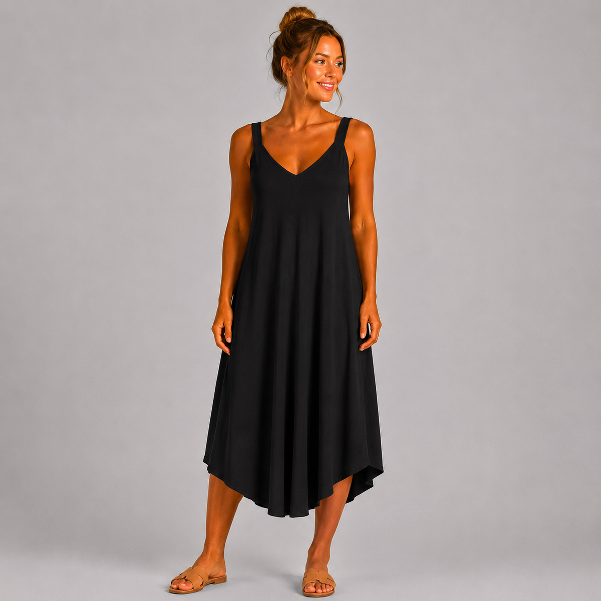 Women’s sleeveless textured swing midi dress with a V-neckline and relaxed flowing fit