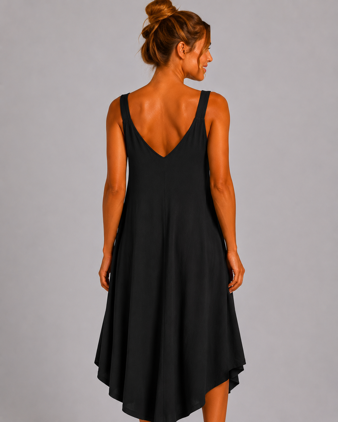 Women’s sleeveless textured swing midi dress with a V-neckline and relaxed flowing fit