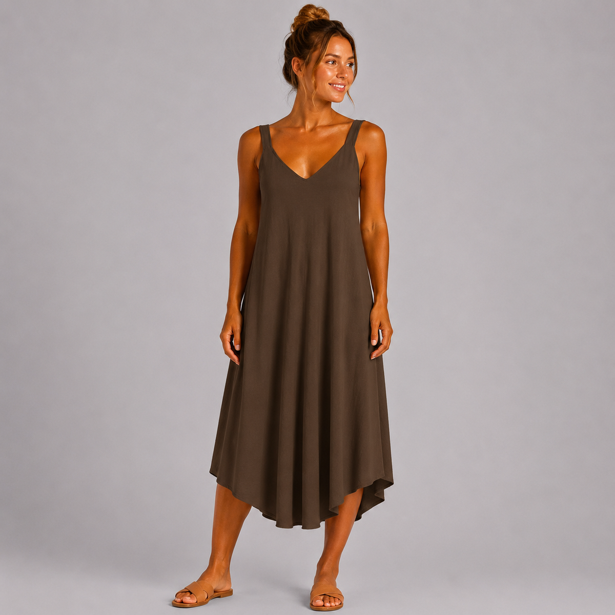 Women’s sleeveless textured swing midi dress with a V-neckline and relaxed flowing fit