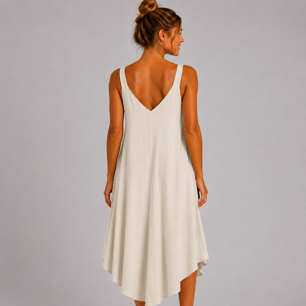 Women’s sleeveless textured swing midi dress with a V-neckline and relaxed flowing fit