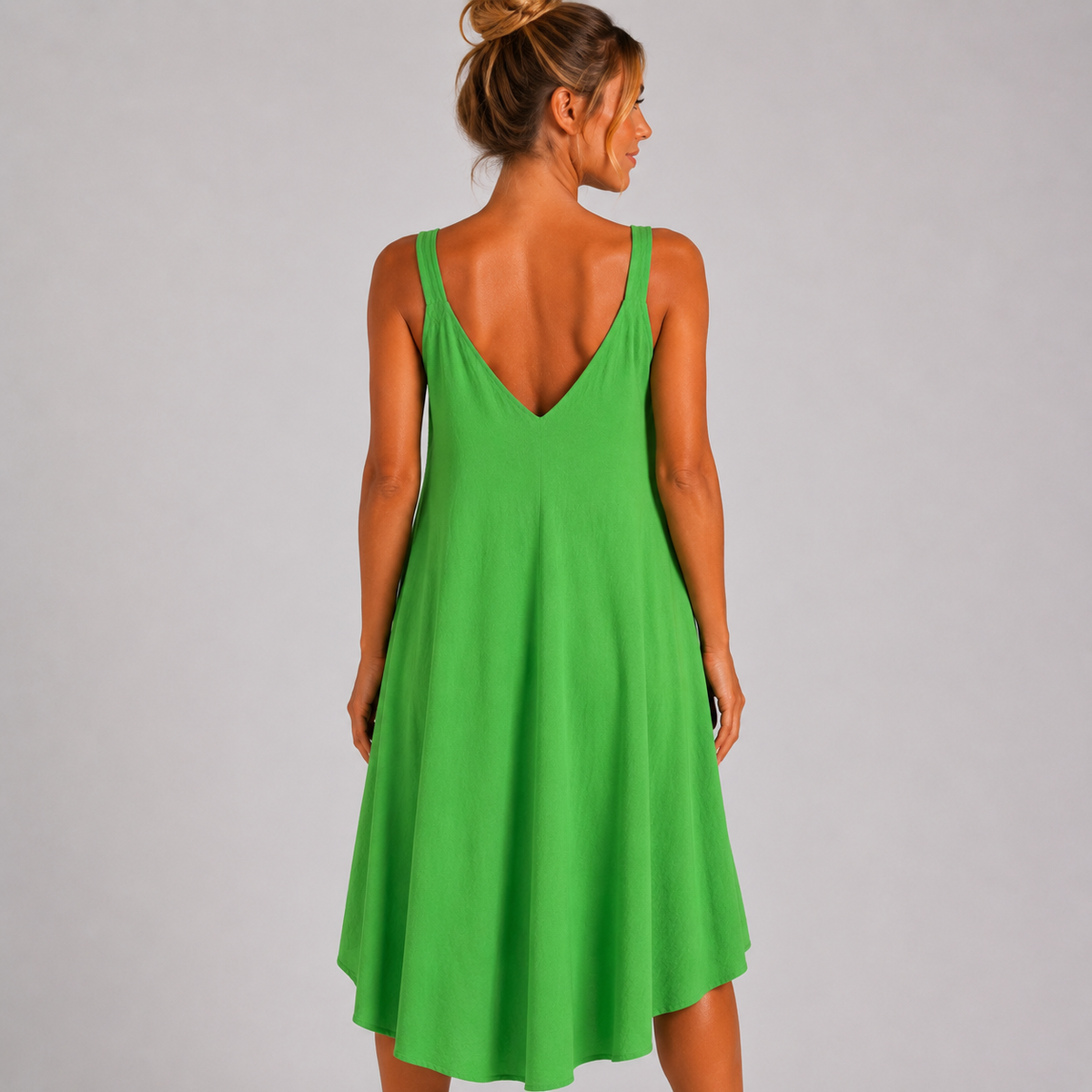 Women’s sleeveless textured swing midi dress with a V-neckline and relaxed flowing fit
