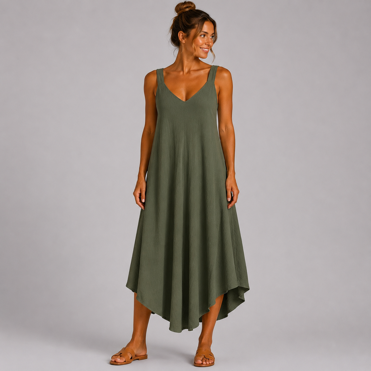Women’s sleeveless textured swing midi dress with a V-neckline and relaxed flowing fit