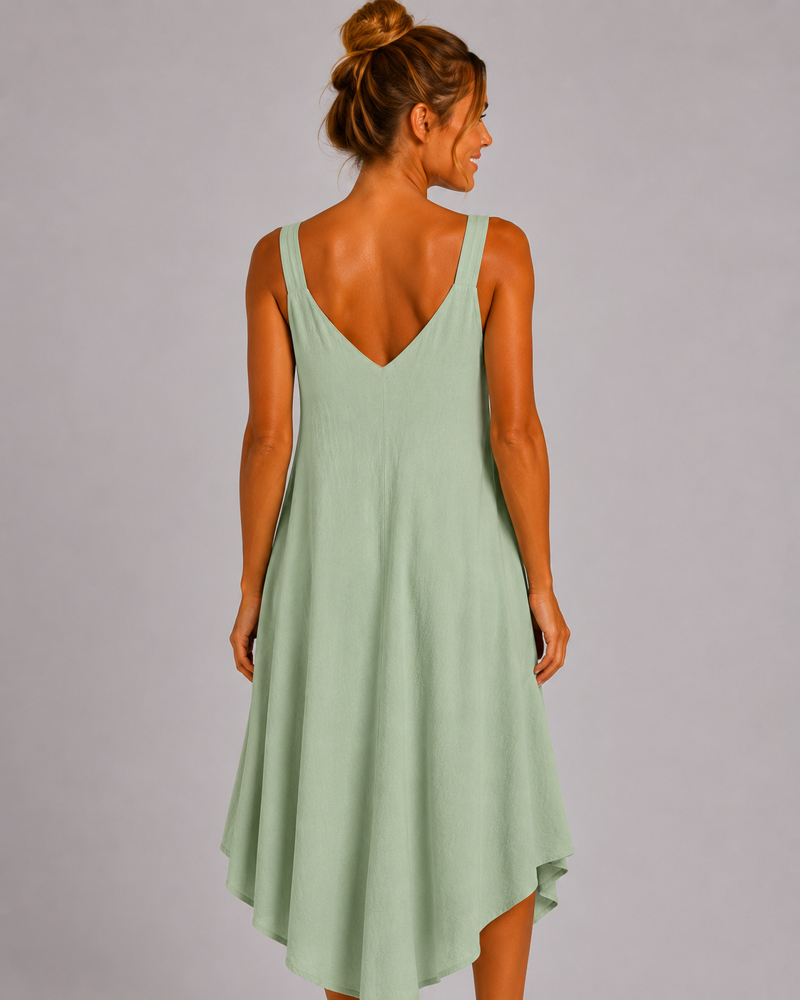 Women’s sleeveless textured swing midi dress with a V-neckline and relaxed flowing fit