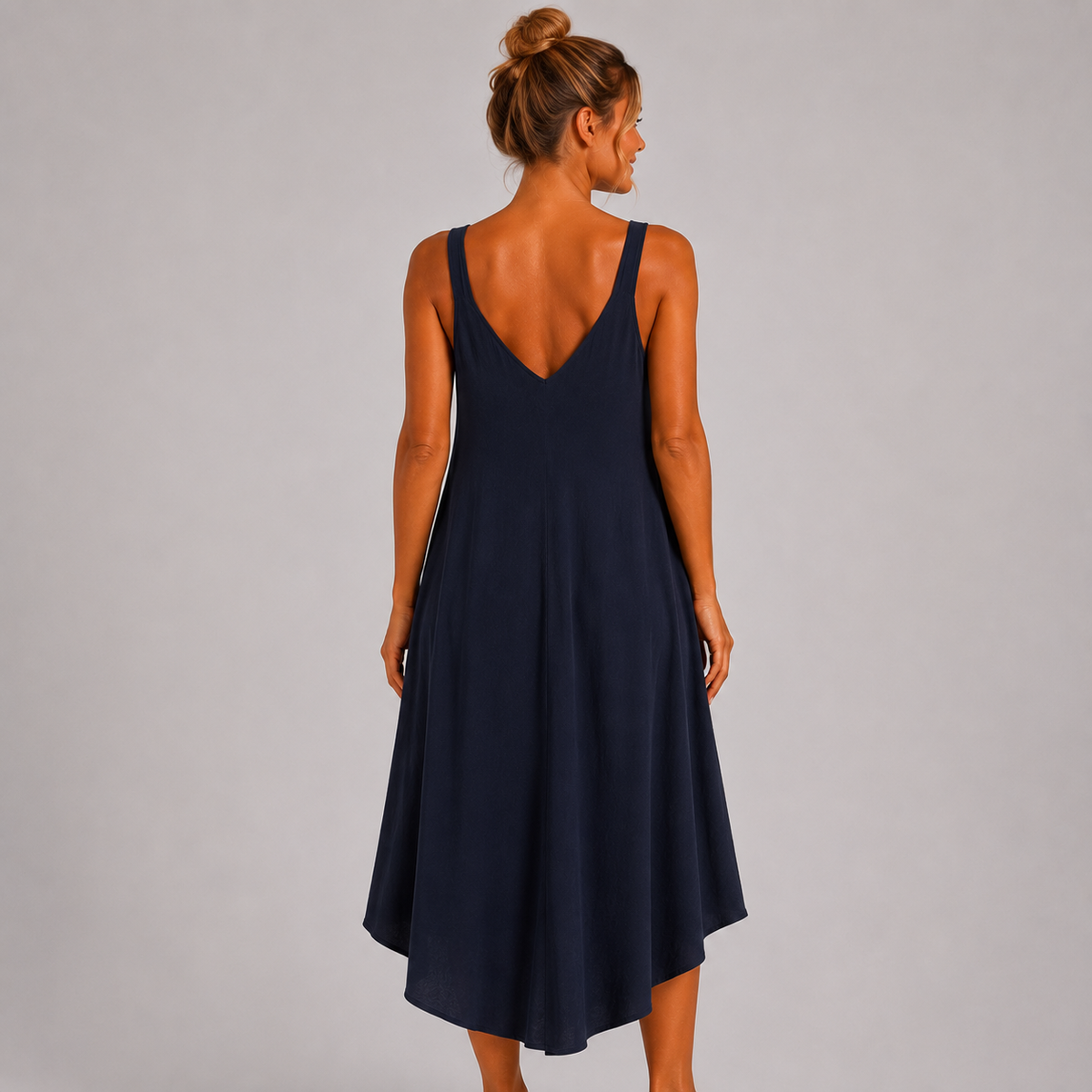 Navy Women’s sleeveless textured swing midi dress with a V-neckline and relaxed flowing fit