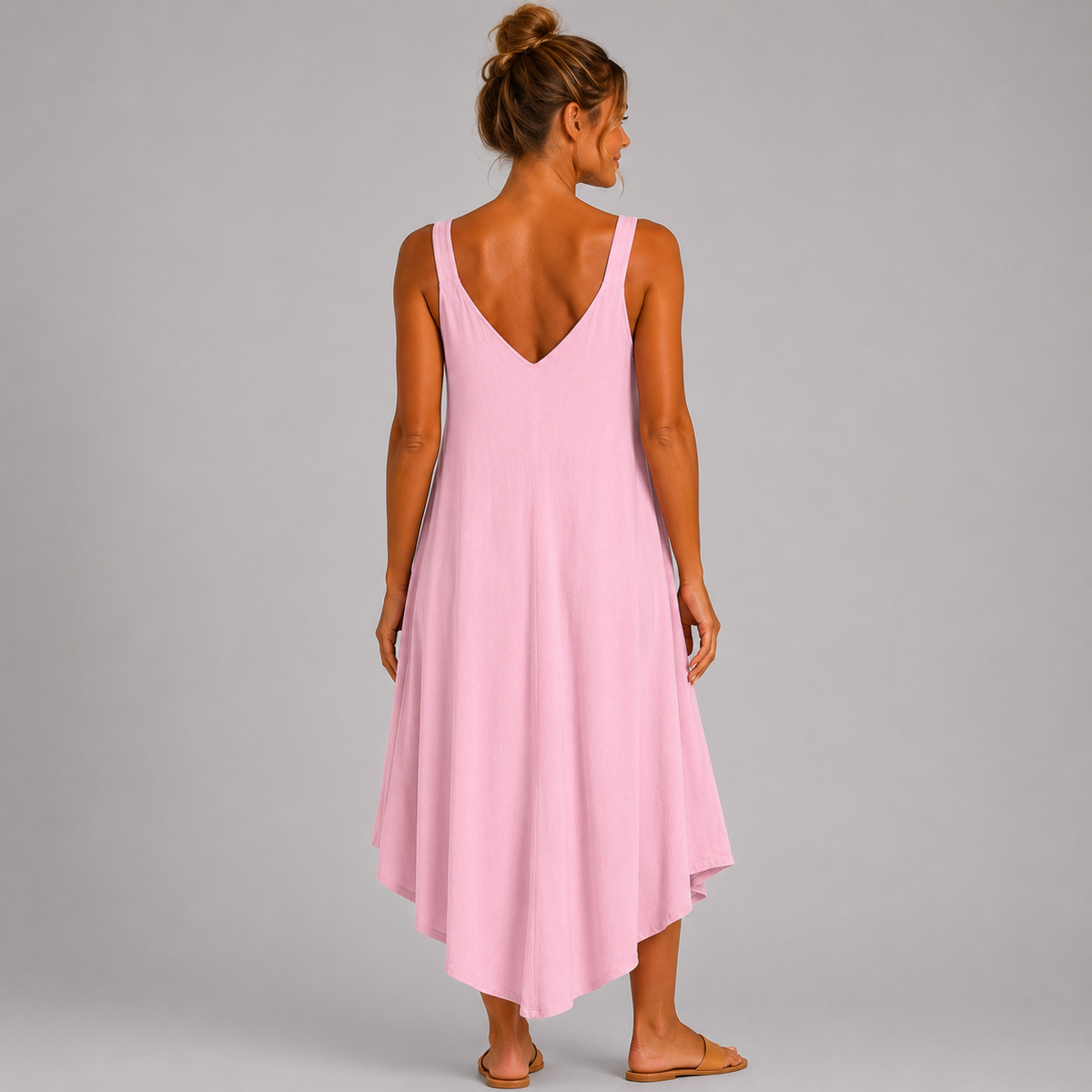 Women’s sleeveless textured swing midi dress with a V-neckline and relaxed flowing fit