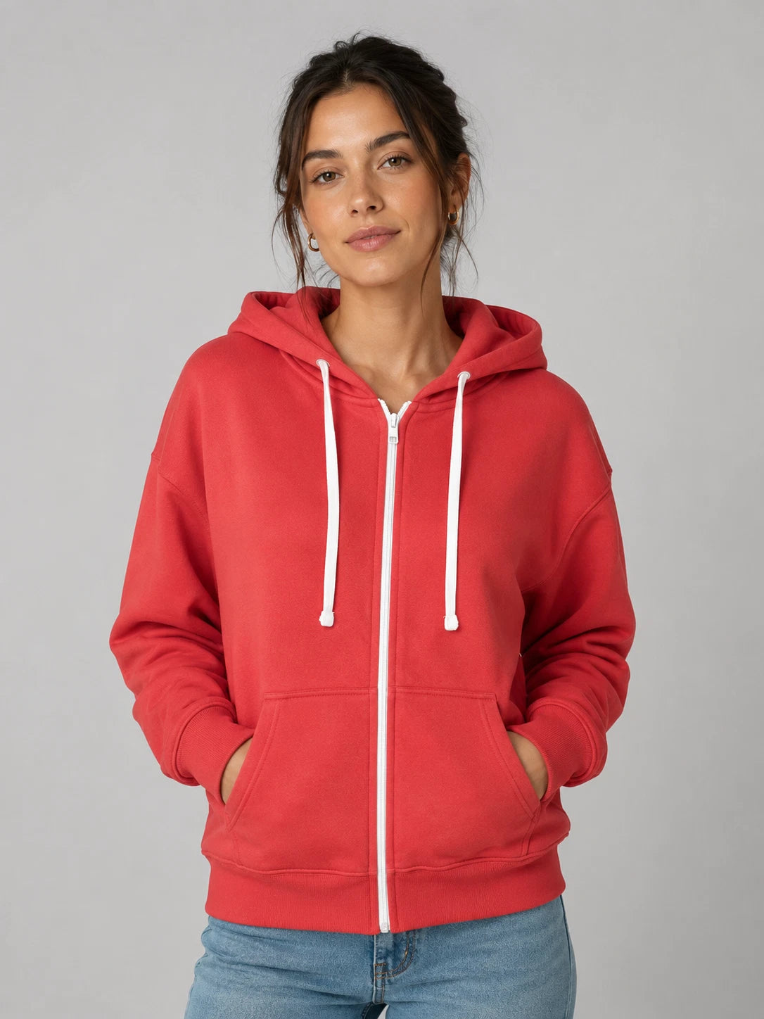 Coral women’s JDN full zip hoodie with drawstring hood, front pockets and ribbed trims.