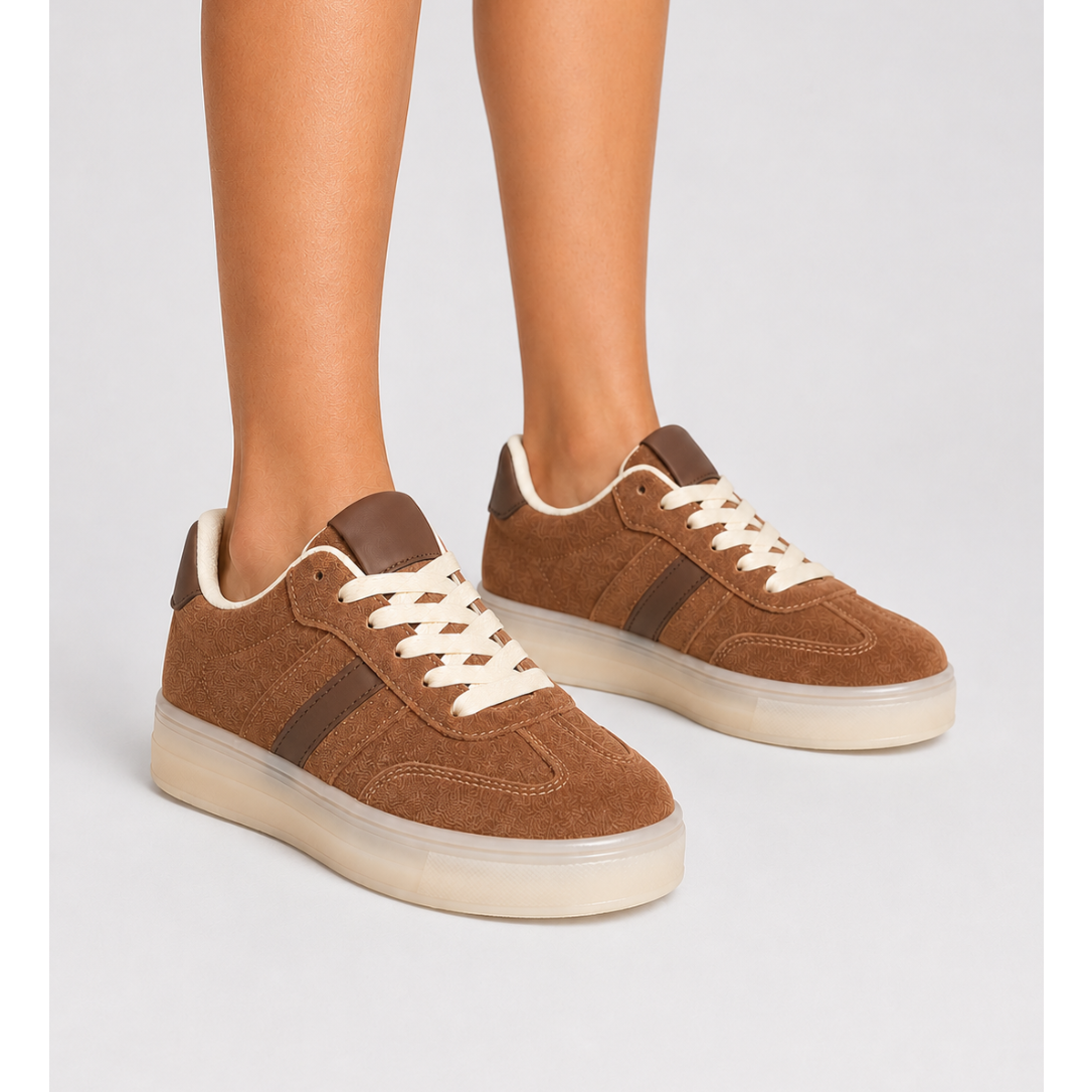 Brown faux suede platform trainers for women featuring contrast side stripes, cushioned lining, lace-up design and thick cream platform sole, perfect for everyday casual wear.
