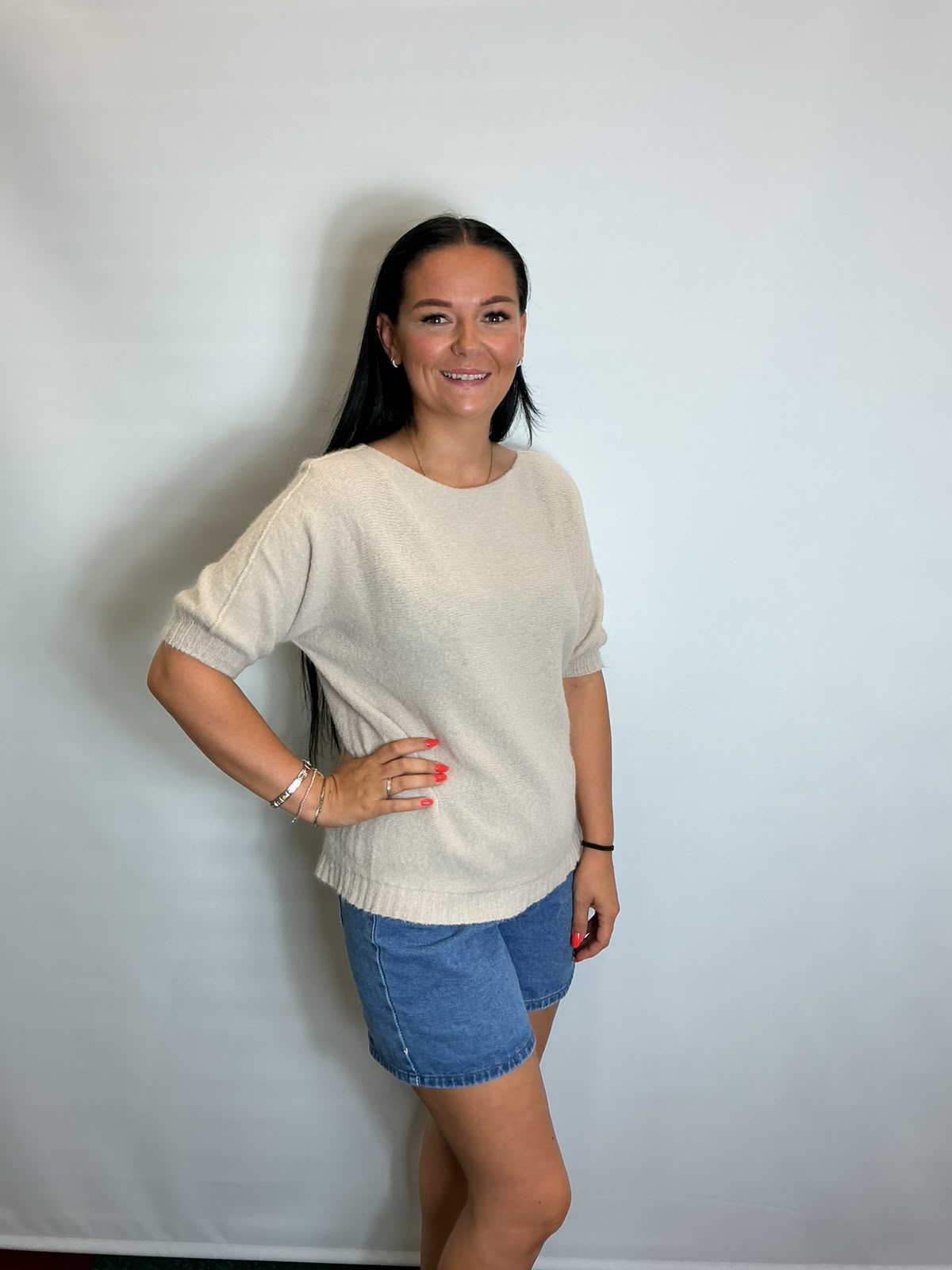 Women’s stone short-sleeve relaxed knit jumper with a wide round neckline and ribbed cuffs and hem.