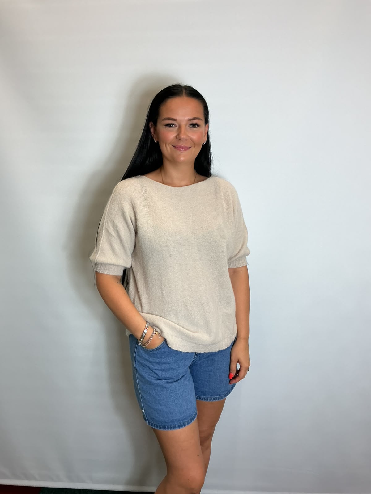 Women’s stone short-sleeve relaxed knit jumper with a wide round neckline and ribbed cuffs and hem.