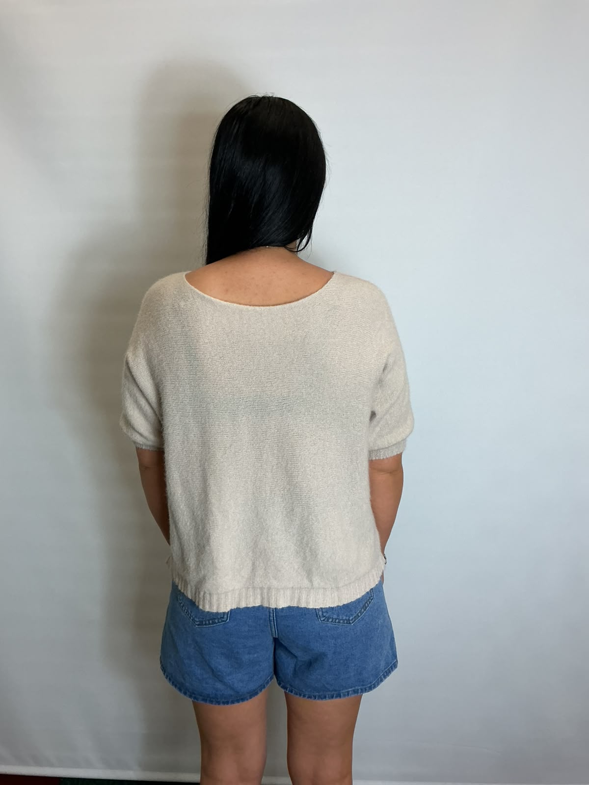 Women’s stone short-sleeve relaxed knit jumper with a wide round neckline and ribbed cuffs and hem.