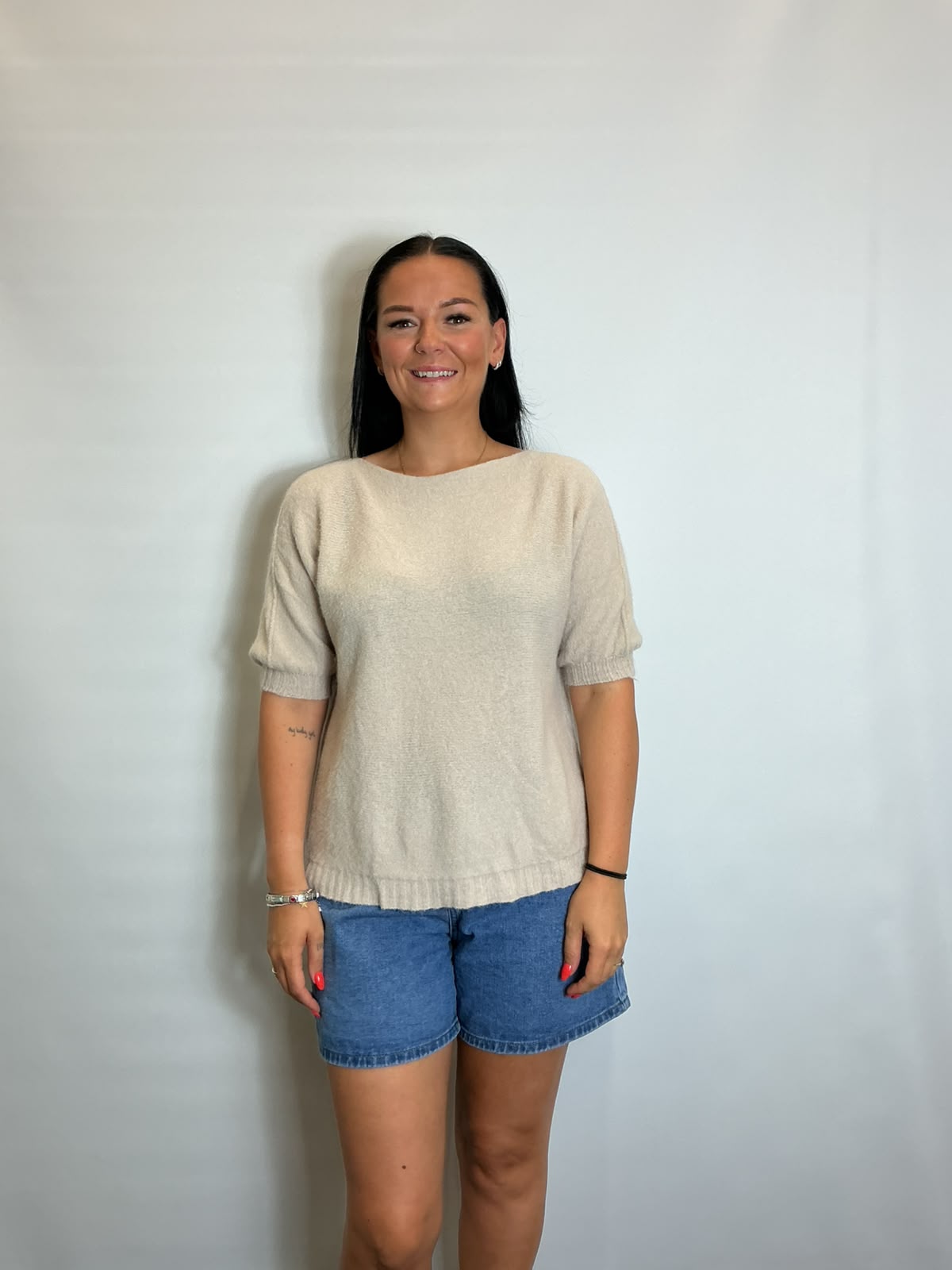 Women’s stone short-sleeve relaxed knit jumper with a wide round neckline and ribbed cuffs and hem.