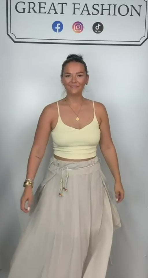 Ladies Italian boho maxi skirt in beige with an asymmetric hem, elasticated drawstring waistband and flowing relaxed fit.