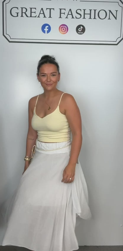 Ladies Italian boho maxi skirt in White with an asymmetric hem, elasticated drawstring waistband and flowing relaxed fit.